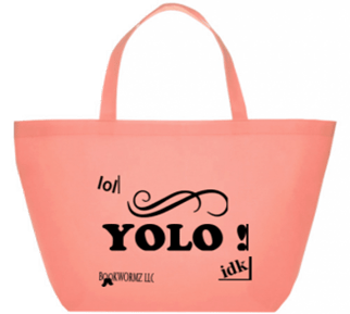 This small canvas tote bag features black lettering of a YOLO message.